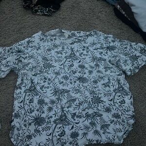 Black and white high neck, ruffle sleeves T-shirt.